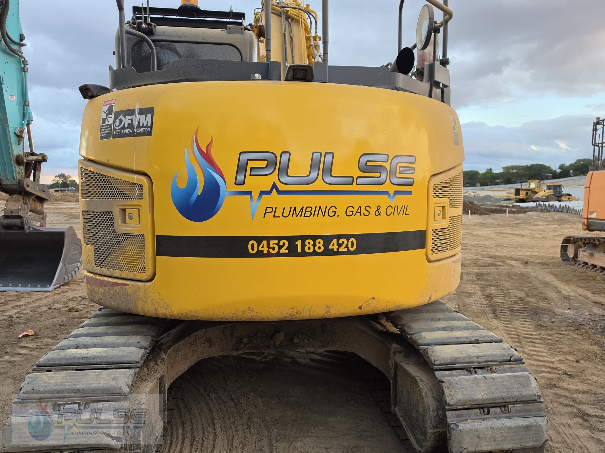Pulse Plumbing, Gas & Civil branded excavator on civil infrastructure project in SEQ